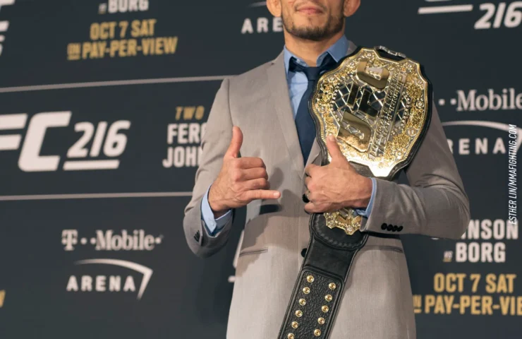 psychology of physical awards shown through a championship belt award ceremony