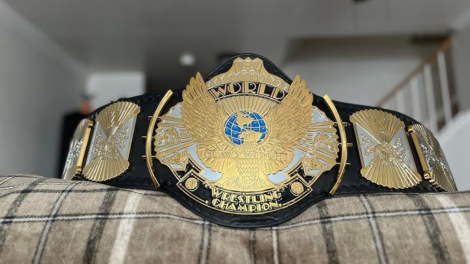 dual plating championship belts with gold and silver plates